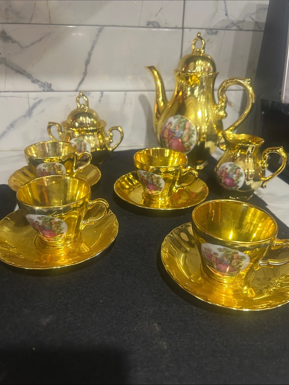 Gold Porcelain Tea Service with Romantic Medallion Accents